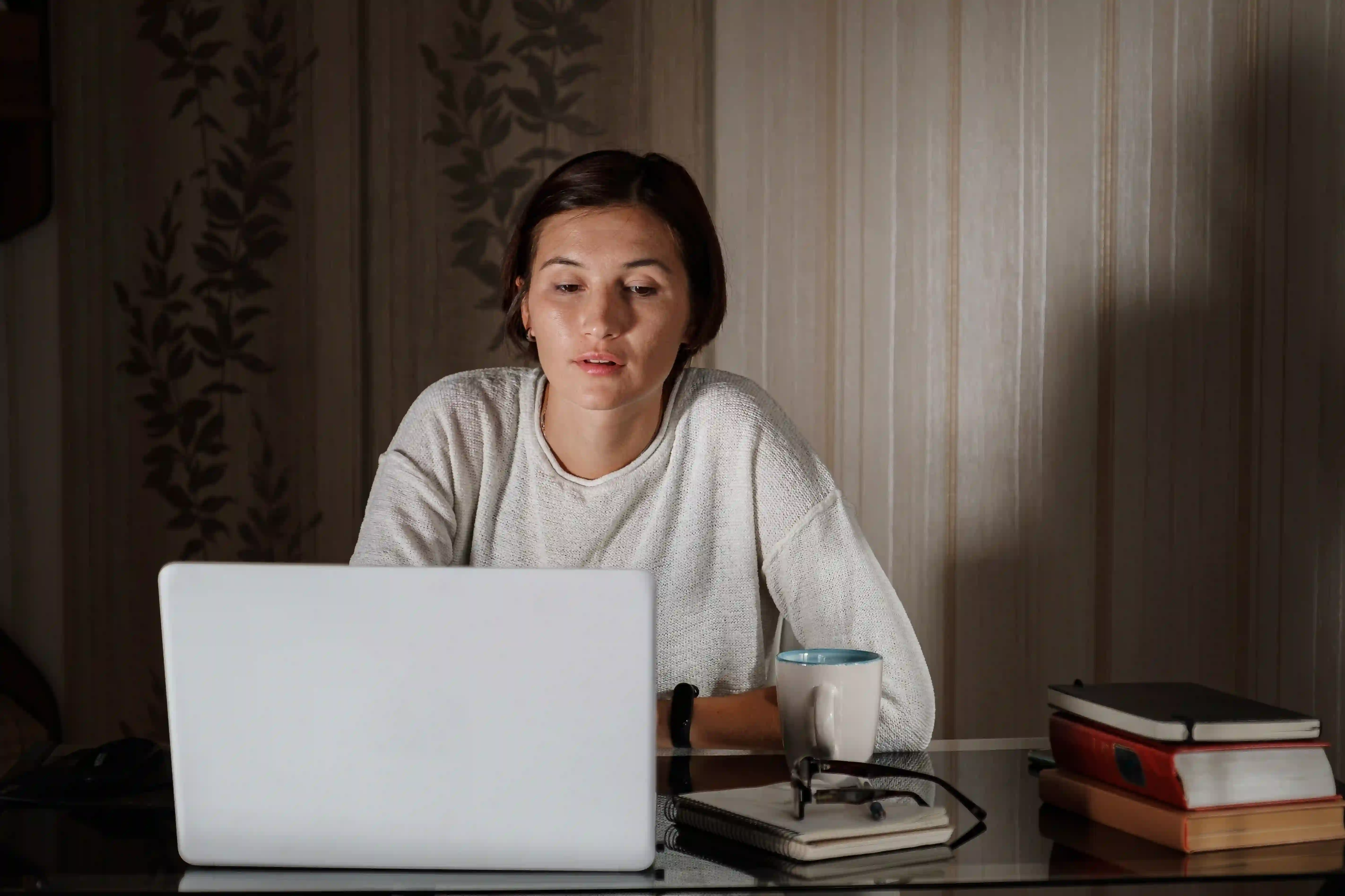 An adult learner in the UK studying at home